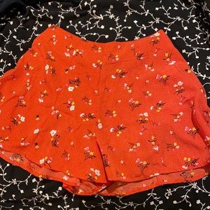 red flowy shorts